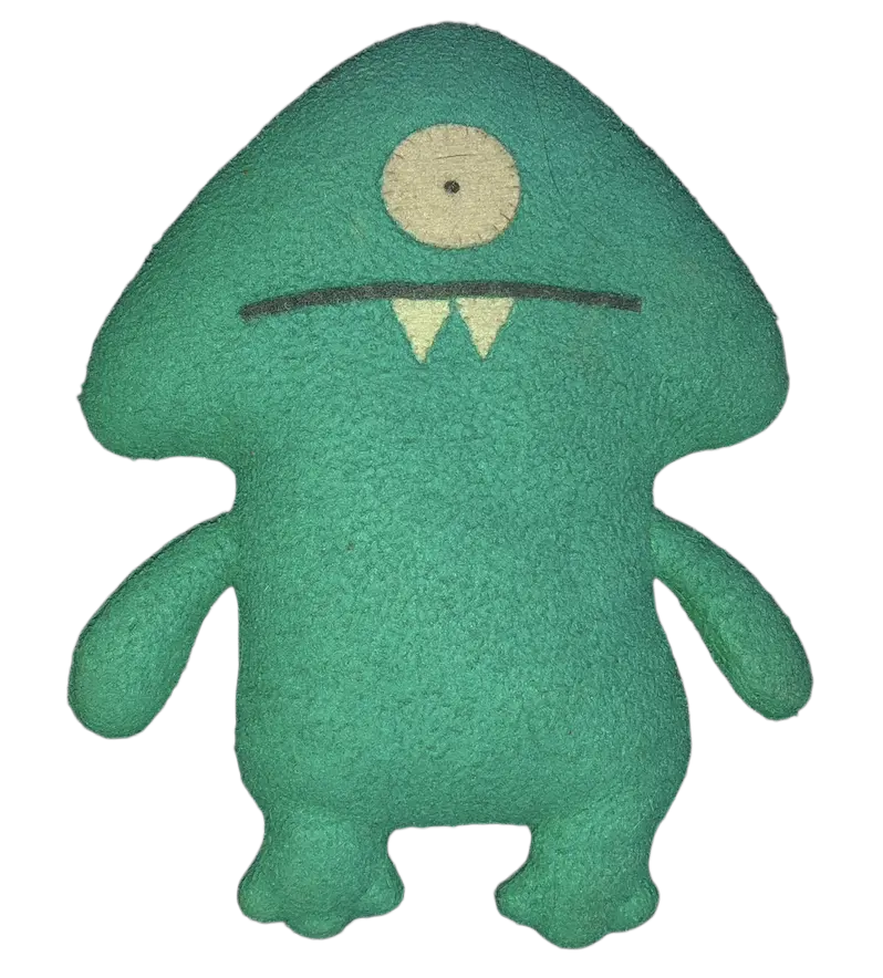 Keltar, a handmade green plush one-eyed mushroom-shaped monster with two small fangs and a straight stitched mouth, front view, cut out on transparent background.